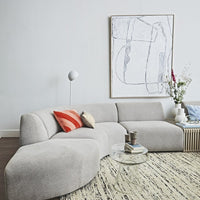 modern living room with large white brutalism canvas on wall