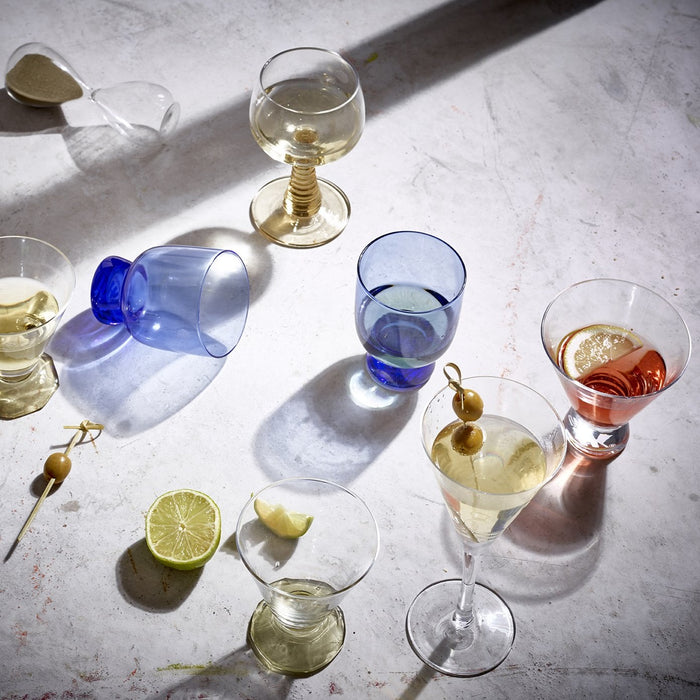 glasses in blue and transparent with drinks