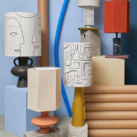 colored table lamps with printed shades in black and white 