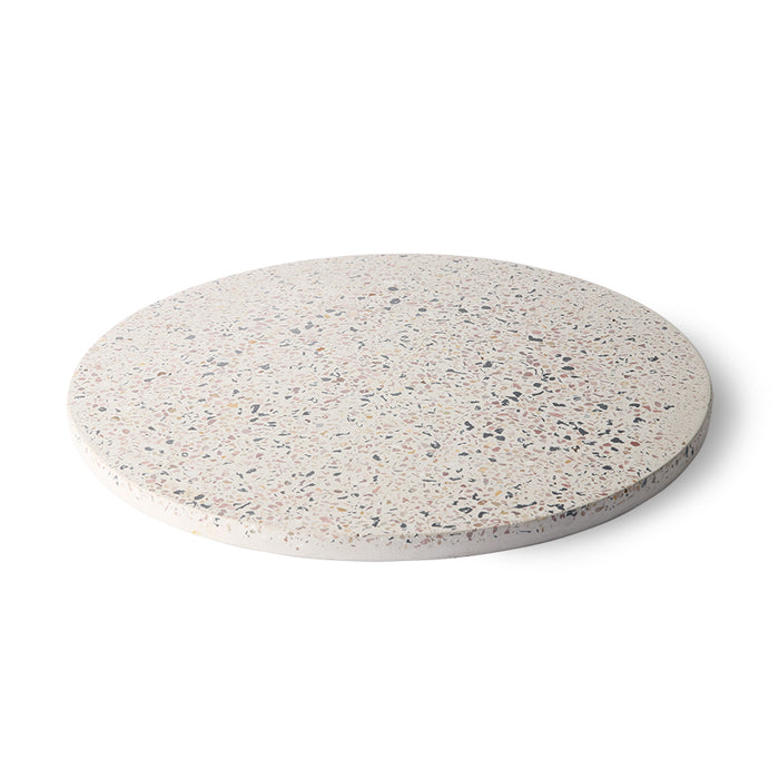 side of round terrazzo serving plate