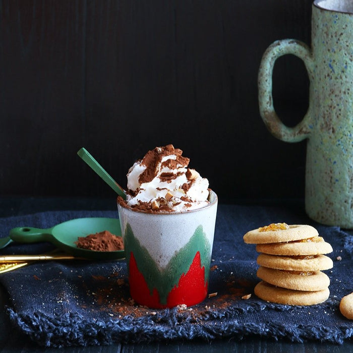 hot chocolate with whipped cream in a hkliving USA christmas mug