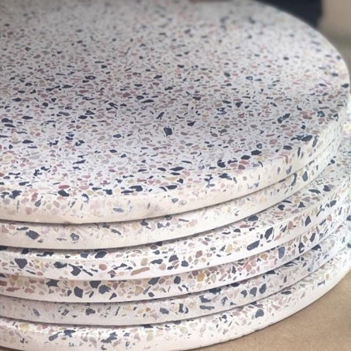 stack of terrazzo plates