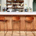 bar with brass metal wire bar stools and velvet cushions