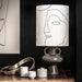 charcoal base and printed faces lampshade combination