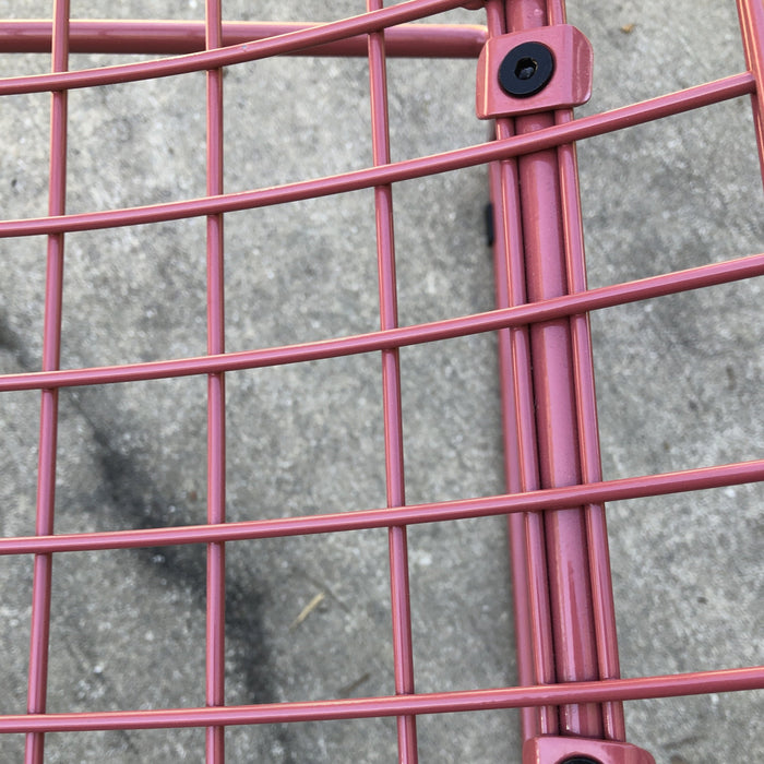 detail of the metal wire red marsala colored chair