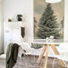 dining room in scandi style with large pinetree wall hanging