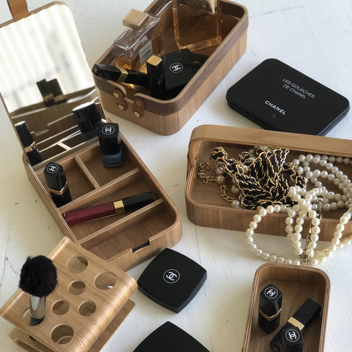 willow wooden accessorie boxes by hkliving filled with chanel make up