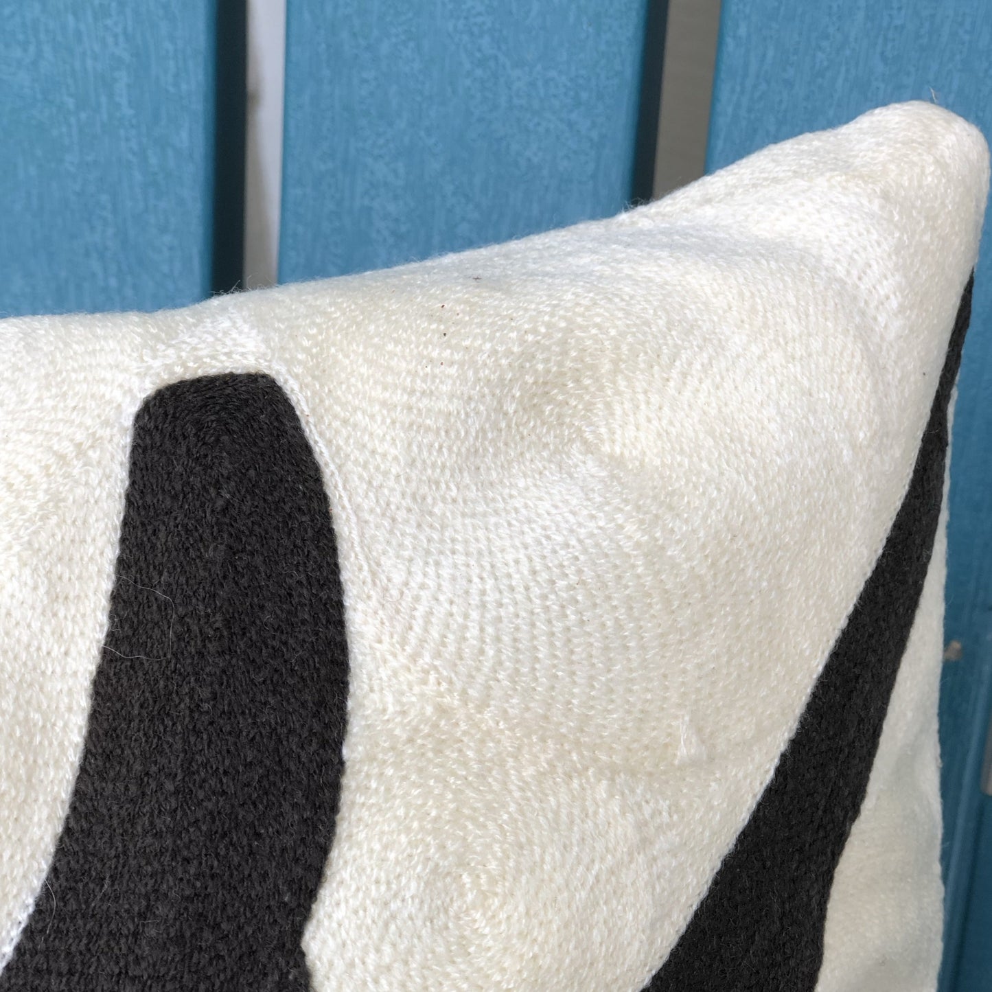 close up of hand embroiled throw pillow