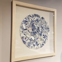 broken porcelain plate, framed in a wooden frame with linen back