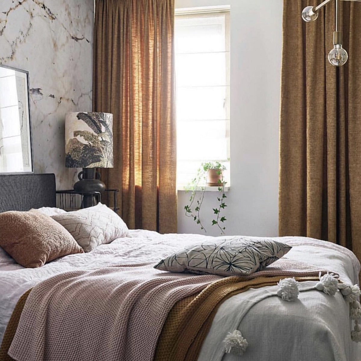 bedroom with jungle print table lamp on charcoal base at nightstand