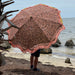 vintage floral retro style beach umbrella at the Gulf of Mexico