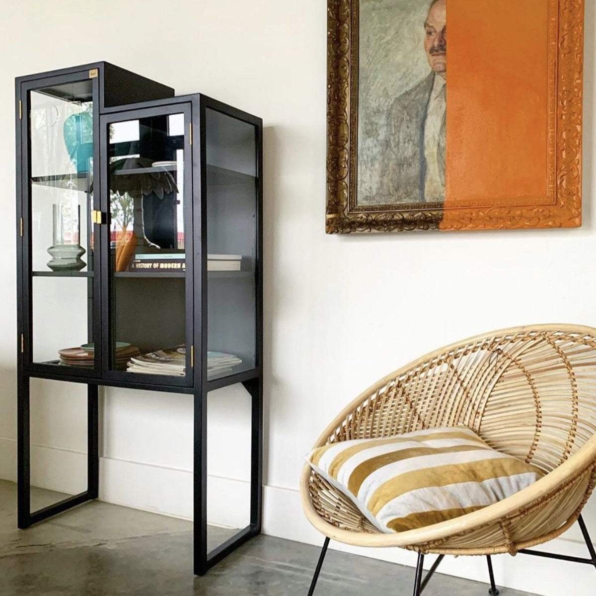 Black showcase cabinet in the shape of staircase. 