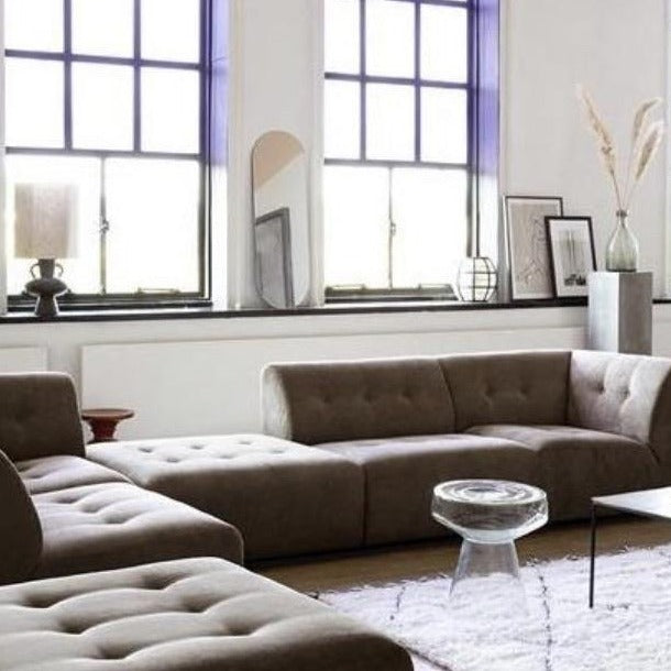brown vint element sofa and glass side accent table