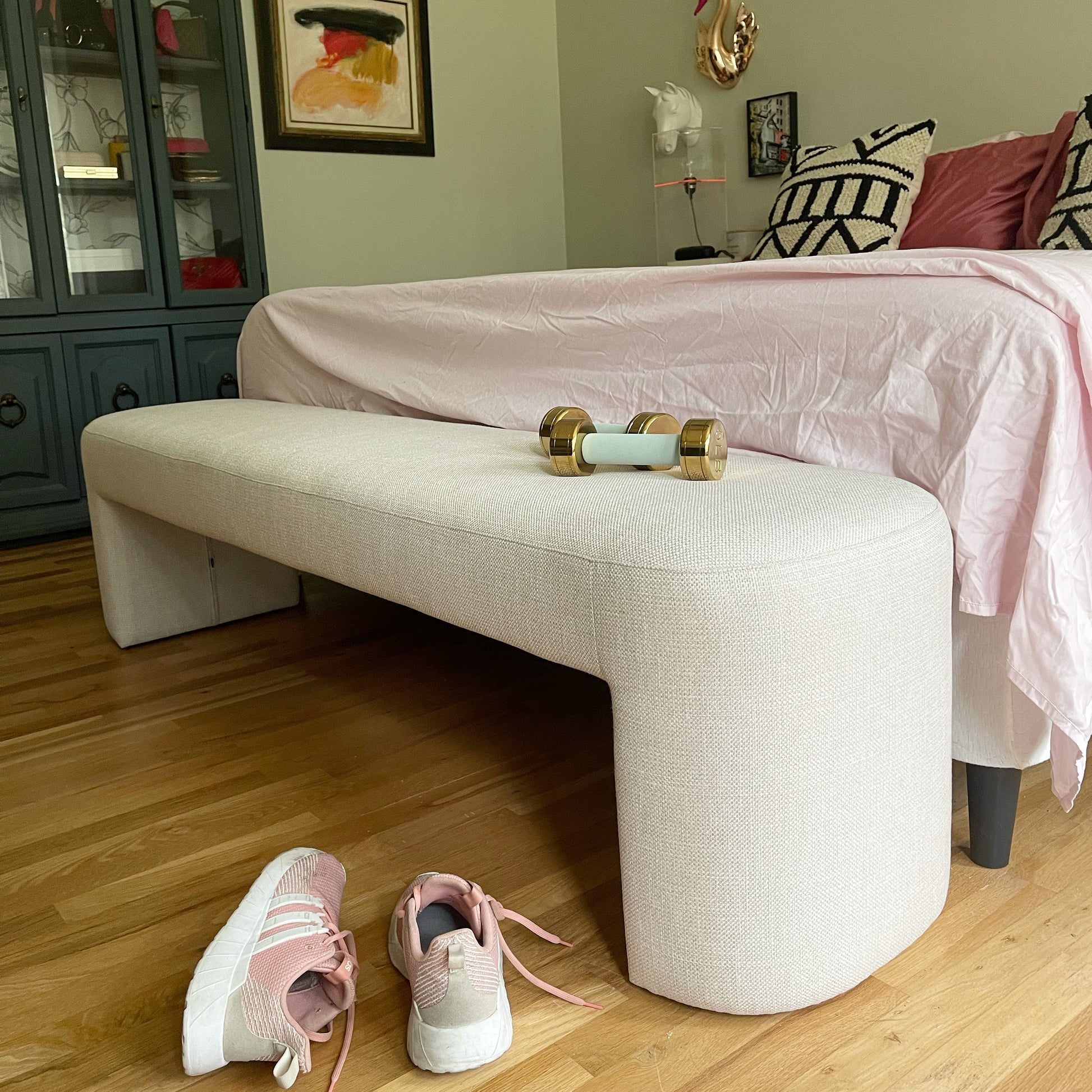 end of bed bench made from natural linen with weights and sneakers