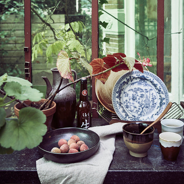 setting in kitchen with plates in the hk living usa kyoto line