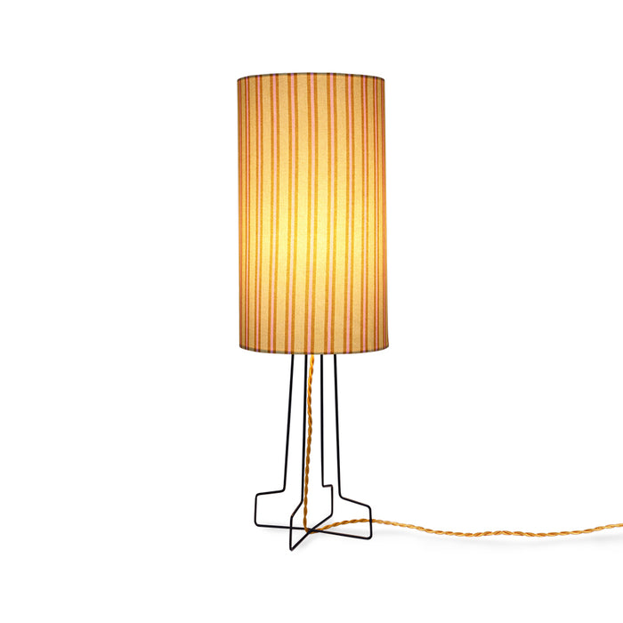 table lamp with striped shade and gold colored cord
