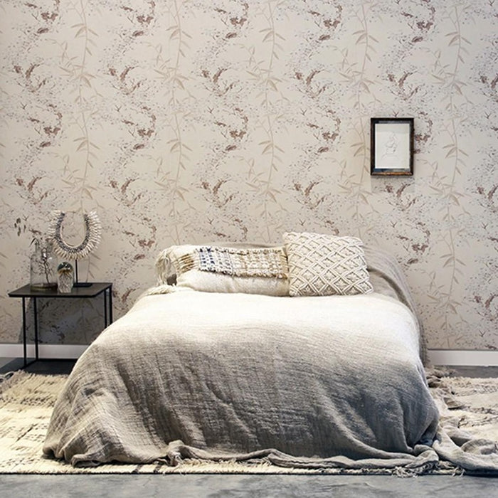 bedroom with linen bedspread and wall with retro cherry tree print wall paper by hk livingusa